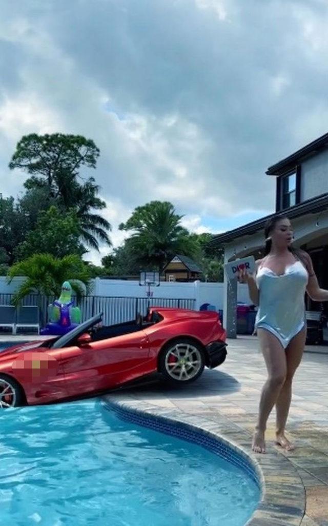 2_Playboy-model-declares-shes-a-good-driver-despite-car-in-swimming-pool