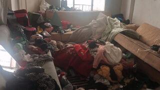 Daireden çıkanlar şaşkına çevirdi! Kamyonlar dolusu çöp bulundu