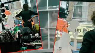 Yarı çıplak camın önüne geçip fotoğraflarını çekti! Karşı binadakilerin kendisini izlediğinden habersizdi