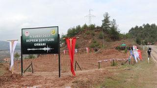 Karabük'te, 6 Şubat depremlerinde hayatını kaybedenlerin anısına 1100 fidan dikildi