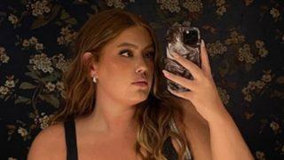 Büyük beden kadınların bikini giyemeyeceğini söyleyenlere inat bikinisiyle uzanarak poz verdi