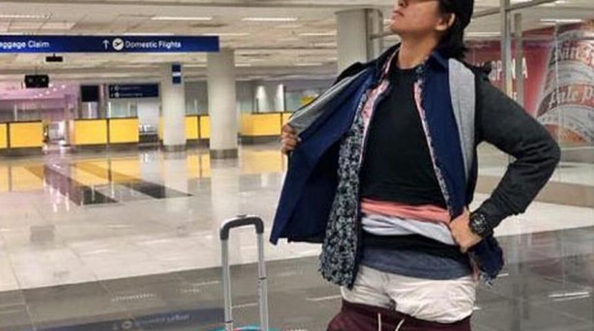 Bir gören bir daha baktı! Ekstra bagaj ücreti ödememek için 2.5 kilogram ağırlığındaki kıyafetleri üzerine giydi