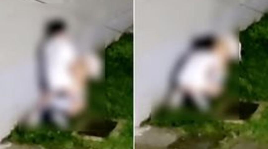 Sokak ortasında cinsel ilişki skandalı! Çevrelerindekilere aldırmadan kaldırımda cinsel ilişkiye girerken yakalandılar