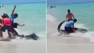 Görenler şaşkınlığını gizleyemedi! Balık oltasına takılan 1.8 metrelik köpek balığının resmen sırtına çıktı