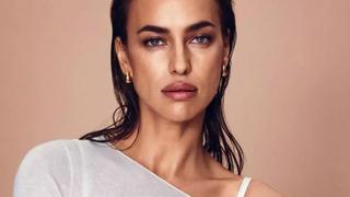 Irina Shayk derin yırtmaçlı elbisesiyle çömelerek poz verdi!  İç çamaşırının görünmesini umursamadı