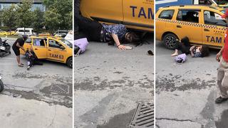 İlginç anlar kamerada! Kendini yerden yere attı, taksici ne yapacağını şaşırdı