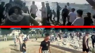 Sığınmacıların Konak Meydanı'ndaki görüntüleri gündem oldu! Kalabalık bir grup genç deniz kenarında...