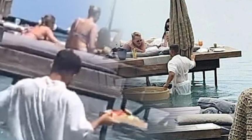 Tatil beldesinden tepki çeken görüntüler... Garsonluk mu kölelik mi?