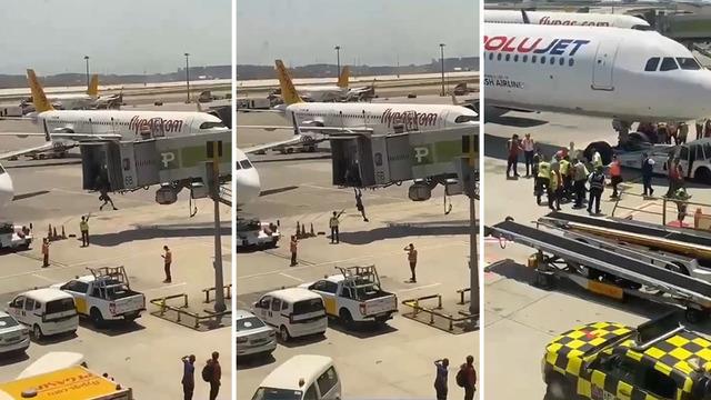 Sabiha Gökçen Havalimanı'nda hareketli dakikalar kamerada! Uçağı kaçıran İsrailli baba ve oğlu, ortalığı ayağa kaldırdı