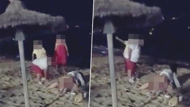 Sahilde cinsel ilişkiye giren çifti görünce öfkeden deliye döndüler! Önce terlikle dövdüler, sonrasında ise üzerlerine kum attılar