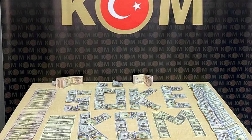 Turizm bölgelerinde piyasaya süreceklerdi... Binlerce sahte dolarla yakalandılar