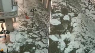 İtalya’da şiddetli dolu yağışının sonrasında oluşan sel ilginç görüntüler oluşturdu! Resmen buzlu su aktı