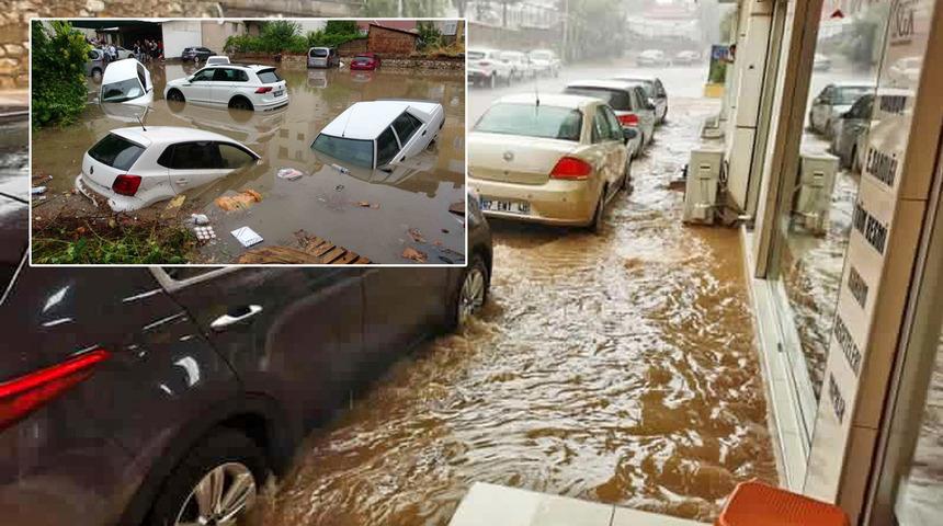 O ilde şiddetli yağmur ve dolu! Cadde ve sokaklar göle döndü... Araçlar suya gömüldü, ev ve iş yerlerini su bastı