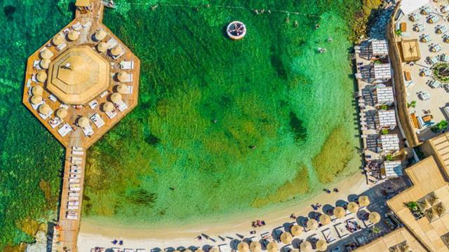Yorucu geçen bir yılı gıptayla bakılacak bir tatil ile unutmak isteyenlere: İşte Alaçatı'nın cenneti anımsatan en iyi plajları!