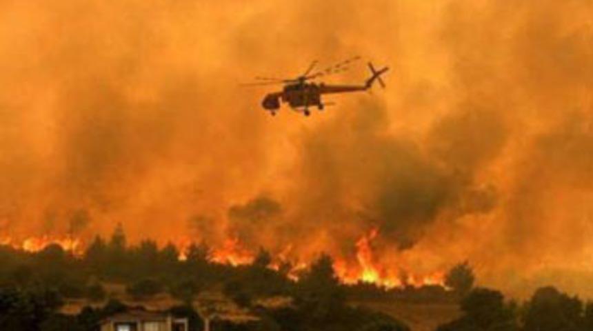 Eşini yakarken Yunanistan'ı tutuşturdu