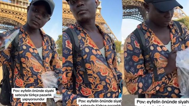 Eyfel Kulesi'nin önünde Türkçe pazarlık! Siyahi satıcı ve Türk müşterinin arasındaki diyalog sosyal medyada gündem yarattı