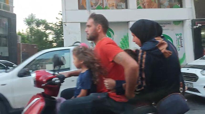 Tehlikeli yolculuk! Motosiklete 5 kişi binip...