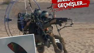 Ellerinde silah, yamaç paraşütüyle... İsrail sınırını böyle geçmişler! Şoke eden görüntüler...