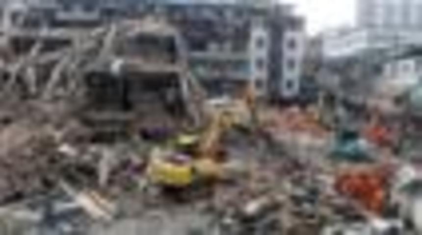 &Ccedil;in'de g&ouml;&ccedil;men iş&ccedil;ilerin yaşadığı binalar &ccedil;&ouml;kt&uuml;: 22 &ouml;l&uuml;