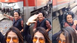 Trenle poz verirken canından olacaktı! Yanındakiler hiçbir şey olmamış gibi gülmeye devam etti