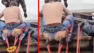 Sosyal medyada şaşkına çeviren görüntüler! Kalçasından çengelle bağlanarak metrelerce yüksekten atladı... Sallandıkça bağırdı