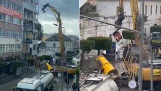 Sosyal medyada takdir toplayan hareket! Yıkım hazırlığı yapılan binadaki Atatürk'ün portresini özenle aşağıya indirdi