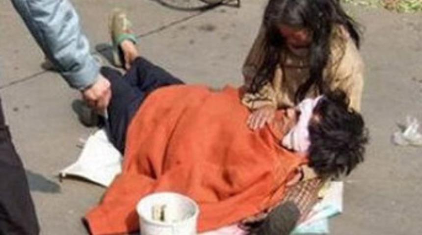 &Ccedil;inli dilencinin vicdan oyunu!