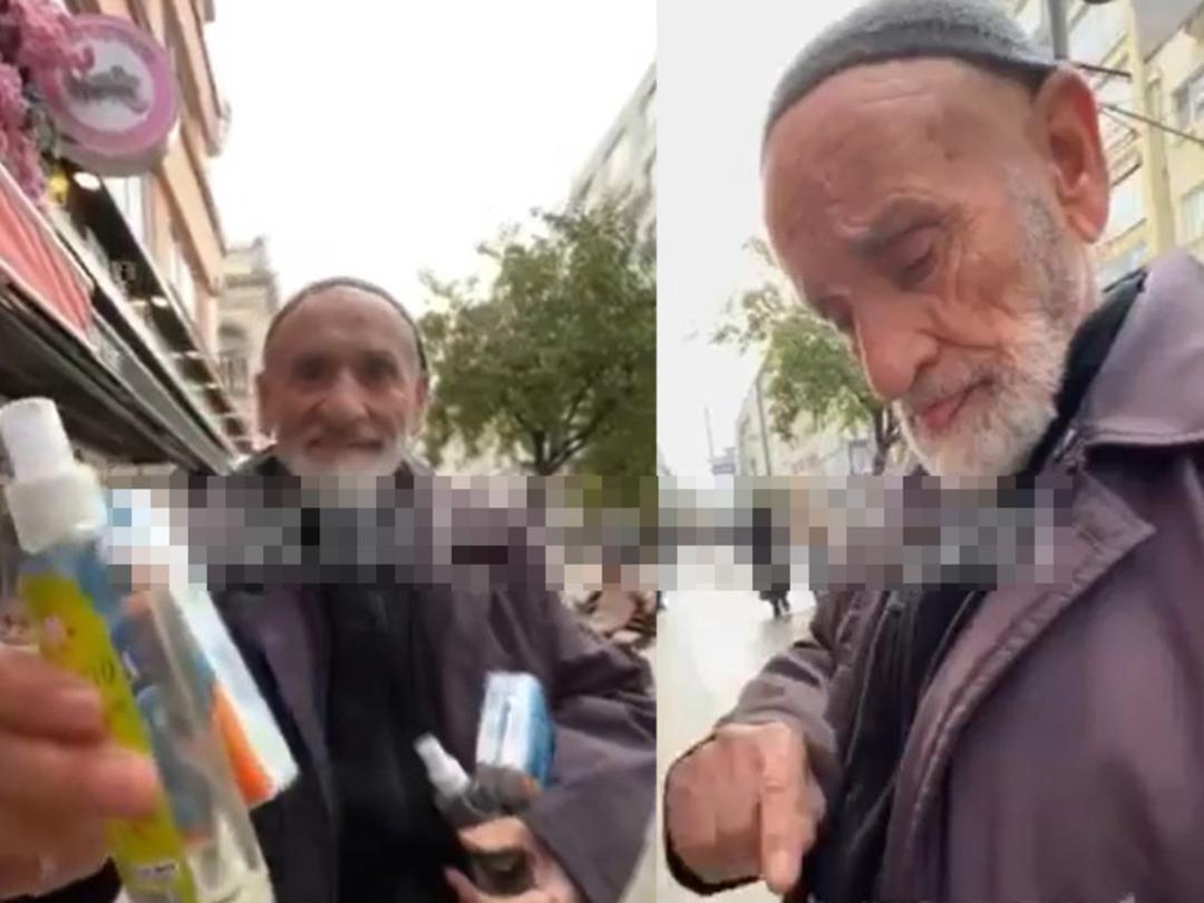 Yaşlı mendil satıcısını g&ouml;ren yabancı turist iki kağıt pe&ccedil;ete istedi! Karşılığında 100 dolar verince sosyal medyada g&uuml;ndem oldu... Sarılarak teşekk&uuml;r etti