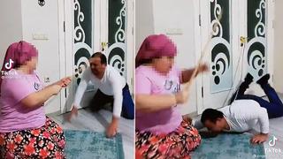 Sosyal medya bu görüntüyü konuşuyor! İpi tasma gibi bağlayıp kapıya düğümledi... Sopayla böyle eğitmeye çalıştı