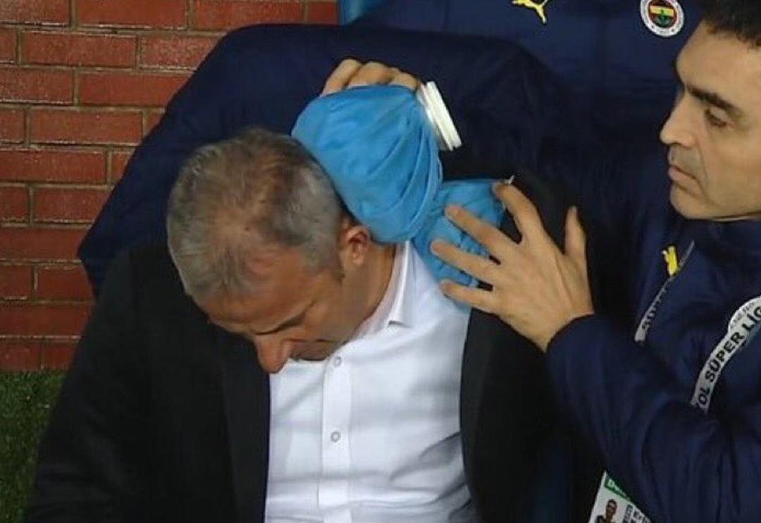 Trabzonspor Fenerbah&ccedil;e ma&ccedil;ında İsmail Kartal'a &ccedil;irkin saldırı! Fred'in gol&uuml;ne sevinmek isterken trib&uuml;nlerden yabancı madde atıldı...