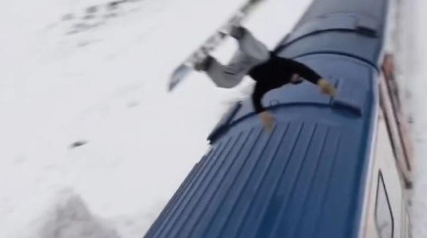 Snowboardla Doğu Ekspresi’nin üzerinden atladı