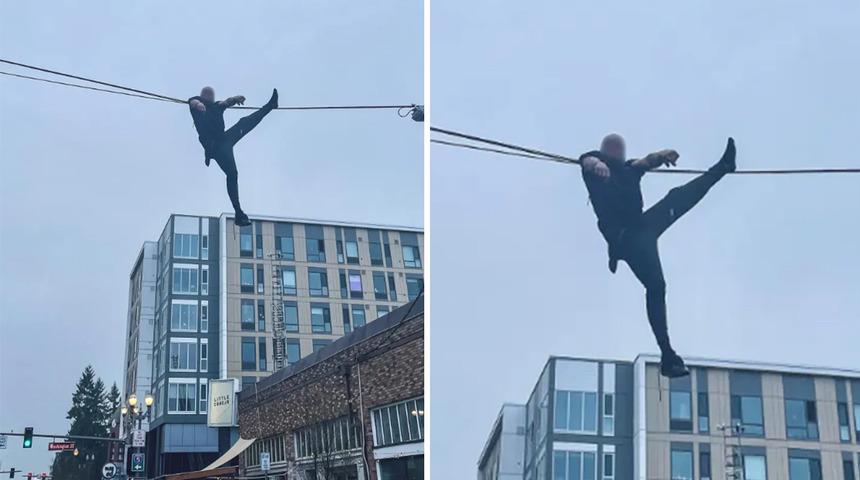 Polisten kaçmak için her yolu denedi! Sonunda telefon kablosuna sıkışıp kaldı... Saatlerce aşağıya indirmek için uğraştılar
