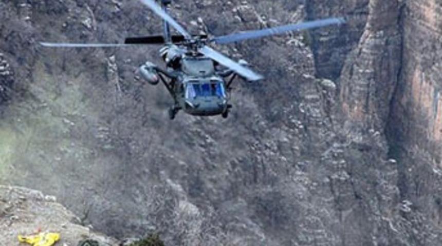 PKK'lılar askeri helikoptere ateş a&ccedil;tı