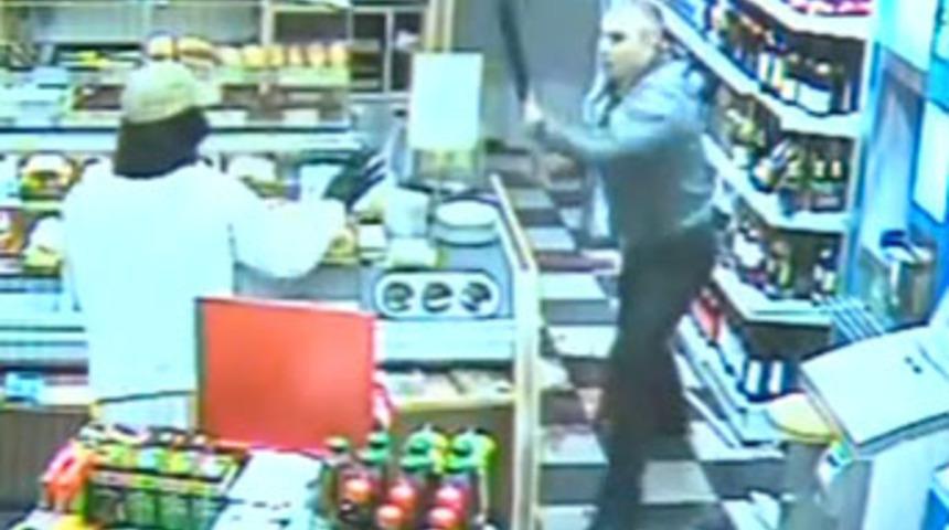 Marketi soyamayınca oturup ağladı