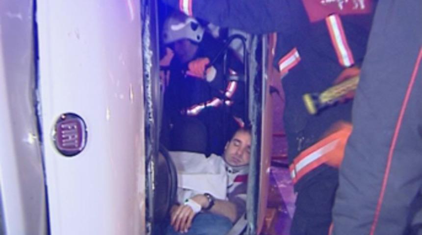 Takla atan sürücü aracında sıkıştı