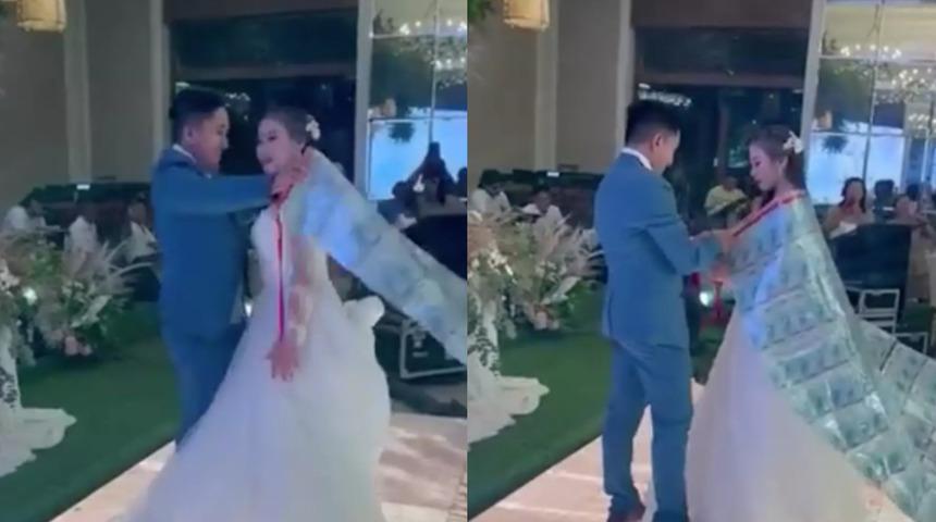 Damadın geline düğün hediyesi herkesi şaşkına çevirdi! Metrelerce uzunlukta paradan yapılan pelerini taktı... Sosyal medyadan yorum yağdı