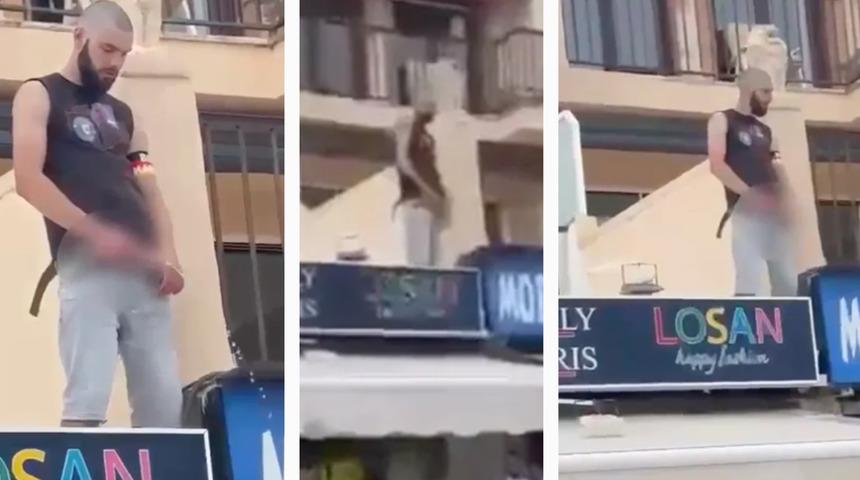 Şaşkına çeviren görüntüler! Balkondan sokağa doğru tuvaletini yaptı... Çevresindekilere aldırış etmedi: Hiçbir şey olmamış gibi arkasını dönüp gitti