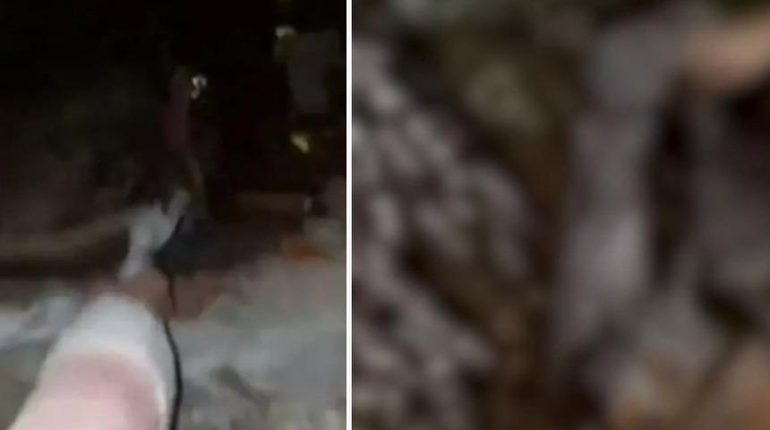 Skandal görüntüler! Cesedi mezardan çıkartıp kıyafet giydirdiler... Dalga geçerek video çekip paylaştılar