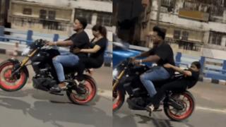 Artistlik yapmak isteyen çift kazadan kıl payı kurtuldu! Lastik ve bisiklet koltuğunun arasında sıkıştı... Çığlık çığlığa yardım istedi