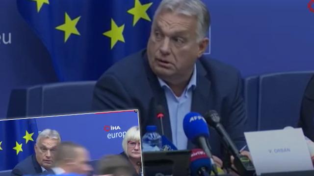Macaristan Başbakanı Orban'a 'hain' protestosu! Üzerine koşup para fırlattı