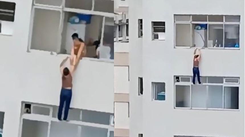 Yardım çığlıkları mahalleyi inletti! Pencereyi temizleyen kadın gökdelenlerden aşağıya düşerken son saniyede tutundu... 5 dakika boyunca yaşam mücadelesi verdi