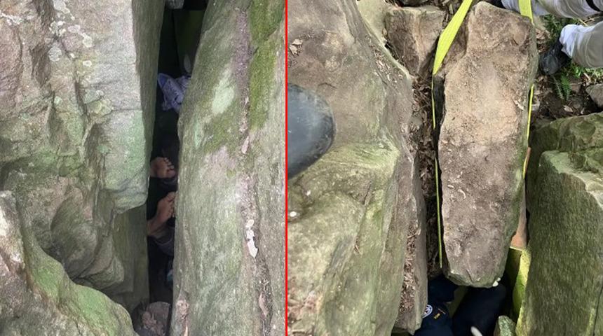 Düşen telefonunu almak için az daha canından oluyordu! Kayaların arasında 7 saat boyunca baş aşağı mahsur kaldı