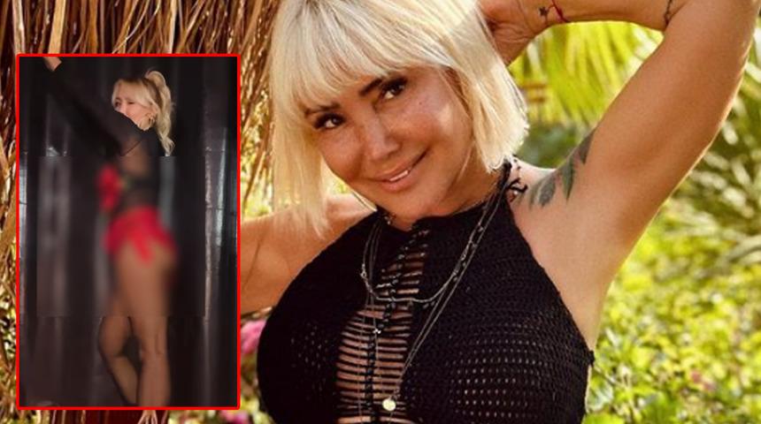 Yonca Evcimik kötü yorumları umursamıyor! Süper mini şortu ve gül detaylı büstiyeriyle beğeni topladı