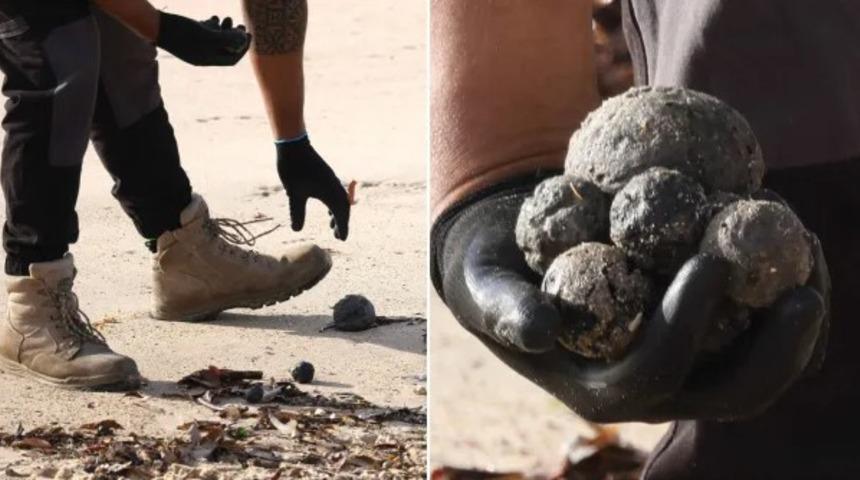 Sahilde bir anda ortaya çıkan siyah toplar herkesi meraklandırdı! Kaynağını henüz bulamadılar: "Son derece kötü kokuyorlardı