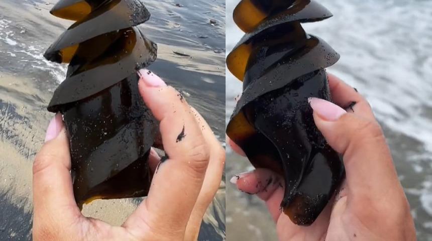 Sahilde yürürken bir anda fark etti! TikTok'ta 46 milyon izlendi... Kimse ne olduğunu anlayamadı: Meğerse köpekbalığı yumurtasıymış