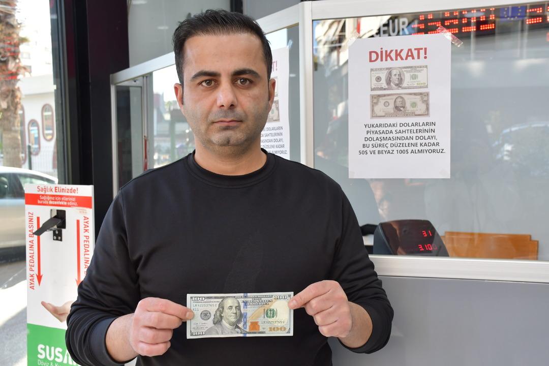 AA-20241128-36322783-36322777-ADANADA_BAZI_DOVIZ_BUROLARI_SAHTE_BANKNOT_IDDIASIYLA_50_VE_100_DOLAR_ALIMINI_DURDURDU