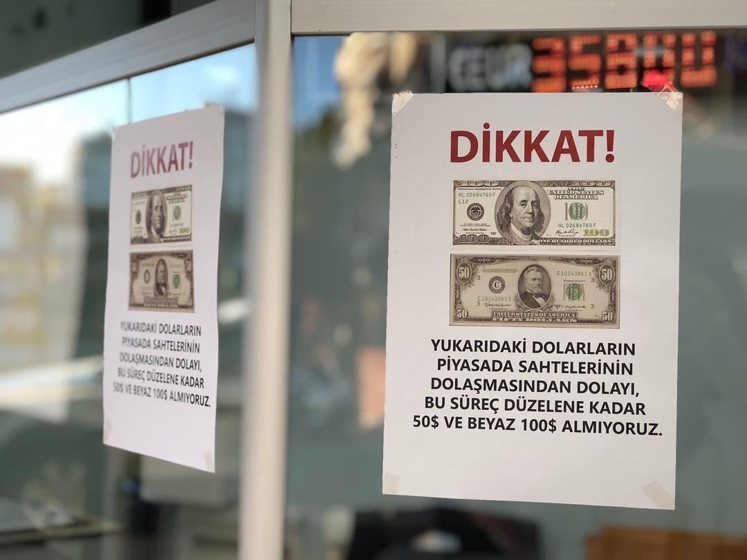 AA-20241128-36322783-36322782-ADANADA_BAZI_DOVIZ_BUROLARI_SAHTE_BANKNOT_IDDIASIYLA_50_VE_100_DOLAR_ALIMINI_DURDURDU