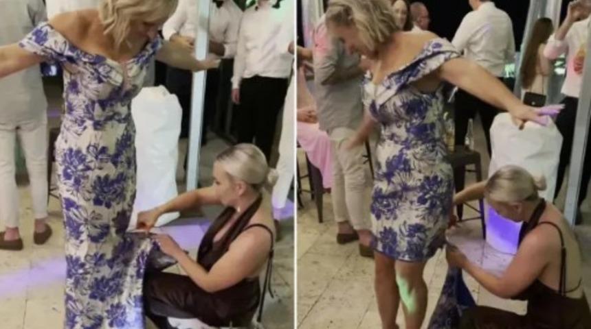 Düğünün ortasında kayınvalideye sıkıntı bastı! Elbisesinden kurtulmak istedi... O anlar sosyal medyanın ilgisini çekti: "Modacısını yanında getirmiş"