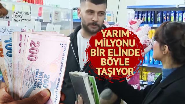 Bir elinde yarım milyon taşıyor! Dükkanın her yerini yazılarla doldurdu... Böyle giderse kapatacak