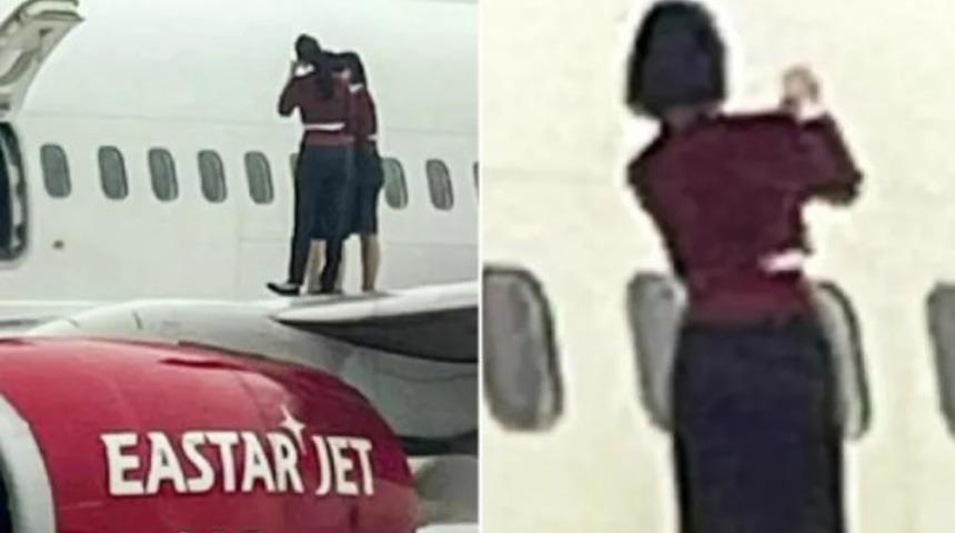 Acil çıkış kapısını açıp uçağın kanadına çıktılar! Hosteslerin selfie çekildiği anlar gündem yarattı